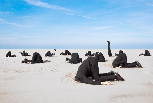 People with Heads In Sand